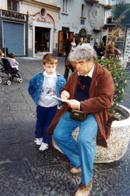 Amalfi: Aprile 1999 - Pierluigi Piccinetti al lavoro col suo taccuino di carta 'Amatruda' in compagnia di un giovane ammiratore